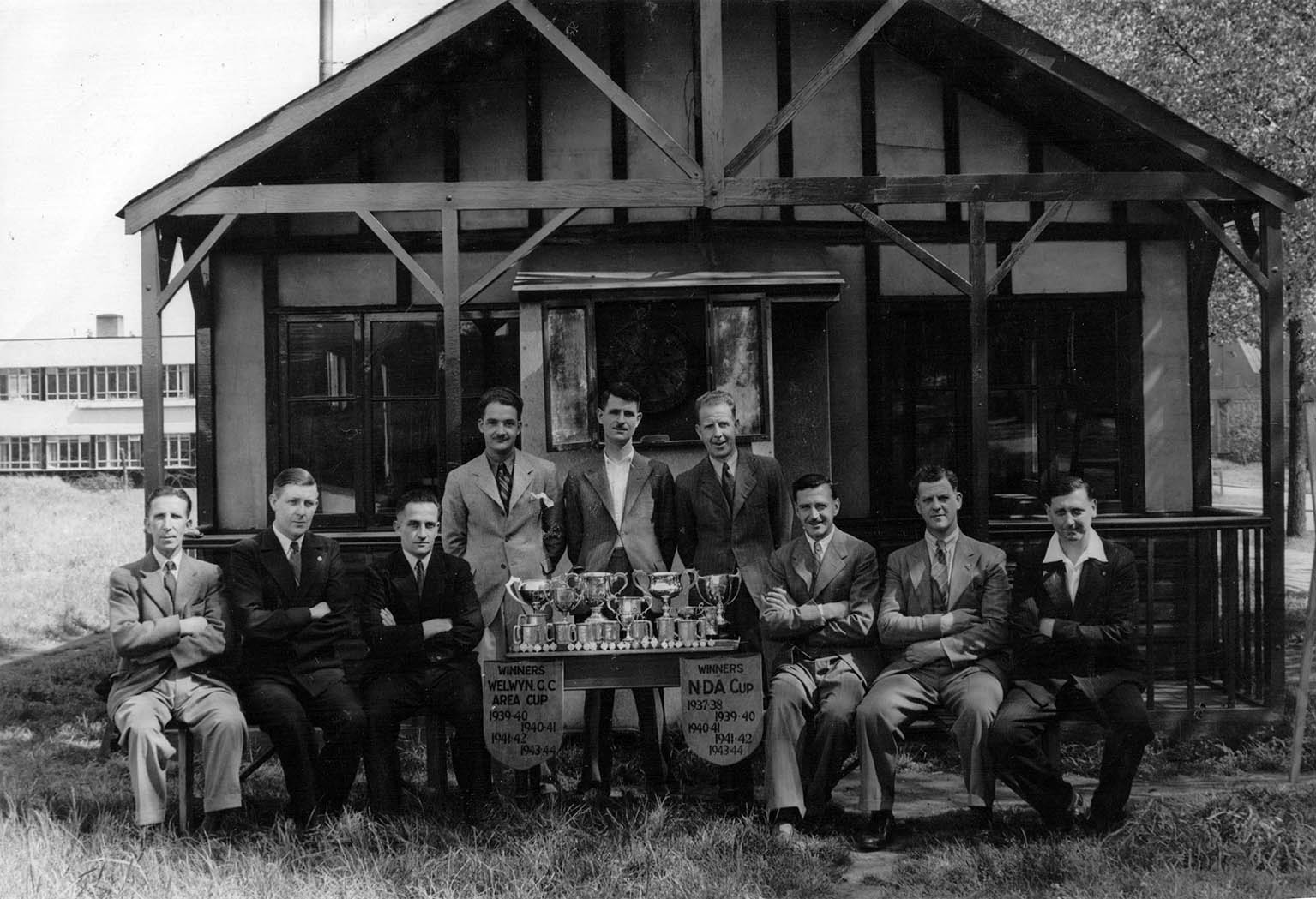 Norton's darts team 1943-44. Standing from left to right: Norman Smith, Cecil Parker, Bert Greatrex. Seated right: Bill Turner, Sid Parker.