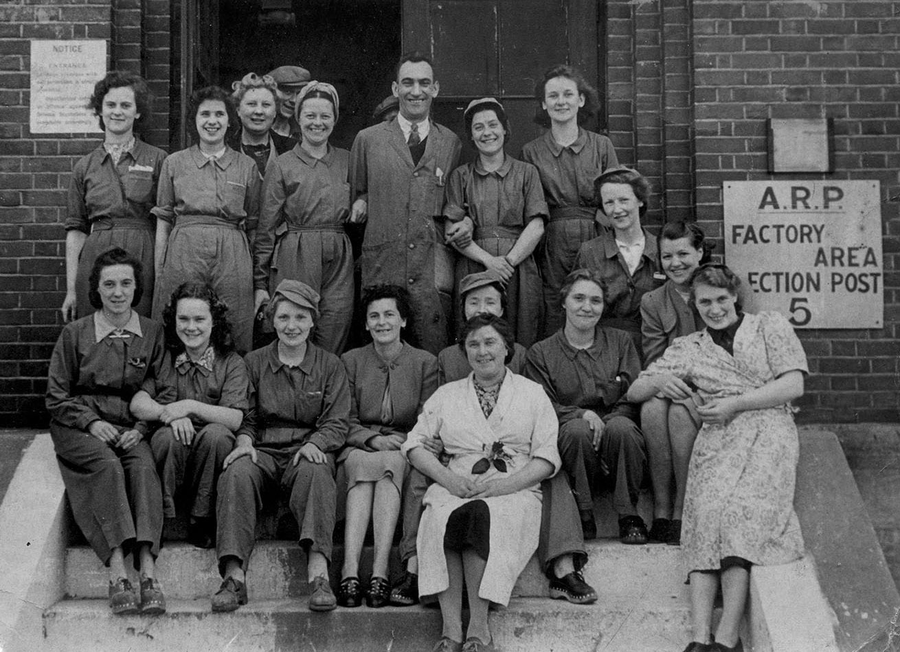 Some of the women working at Nortons during WWII (note A.R.P. sign on right of picture).